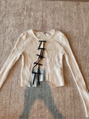 Kimchi Blue Cream Ribbed Cardigan with Black Bow Accents